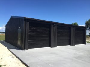 garage nz shed nz black steel garage in rural setting nz